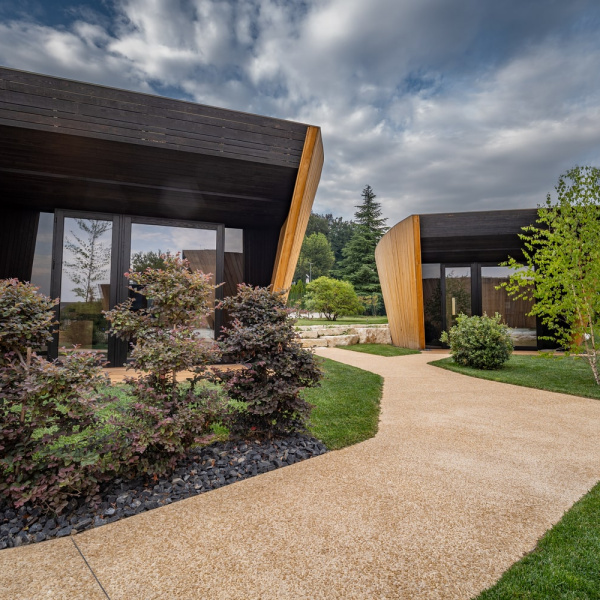 ItalianTerrazzo®, giallo ocra expose aggregate paving. Roggia dei Cedri, Valdobbiadene, Italy Project: Segni Architecture Studio Arch. F. Callegaro & Arch. E. Favero