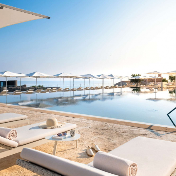 Plam Stampable, stamped concrete floor champagne color, cool white  shades. ClubMed. Cefalù, Italy
